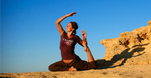 jodi performing yoga in the desert